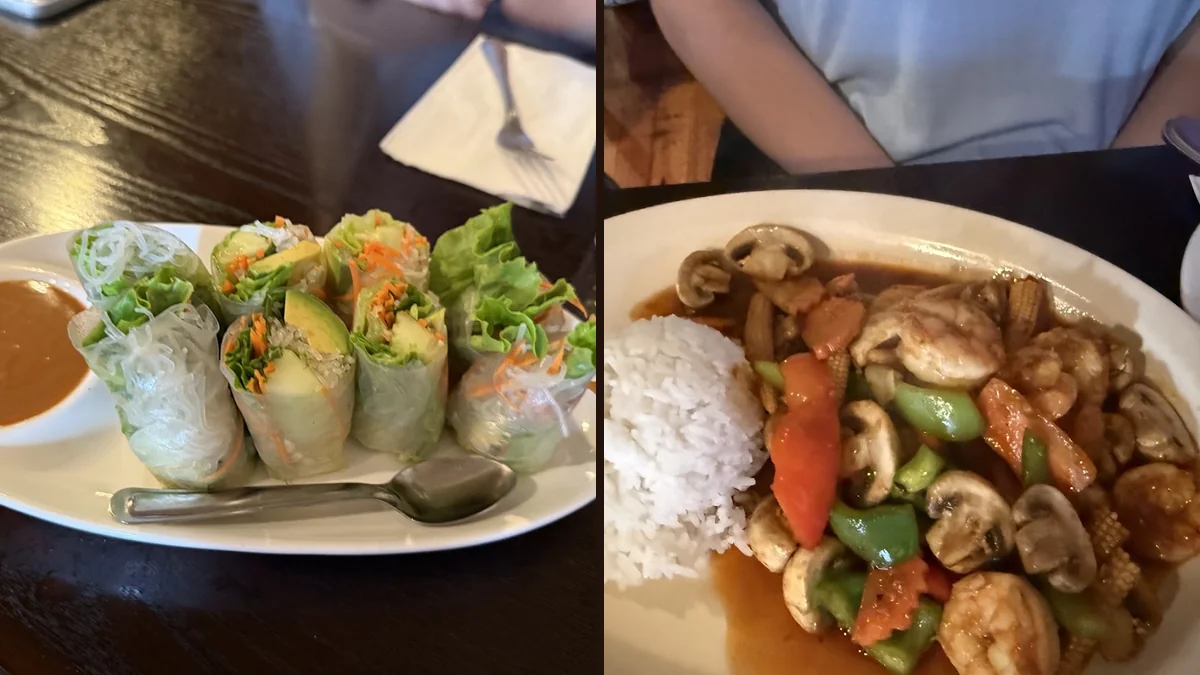 Thai dishes on a relaxed restaurant table.